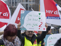 Employees from Postbank branches are going on strike in Essen, Germany, on February 21, 2024, as the Verdi labor union calls for a nationwid...