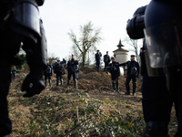 Gendarmes Mobiles are standing guard near the 'Crem'Arbre' ZAD in the woods in Saix, Tarn Departement, on the planned A69 highway between To...