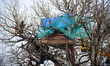 Firefighters and policemen from the CNAMO, a specialized unit, are trying to dislodge an '...