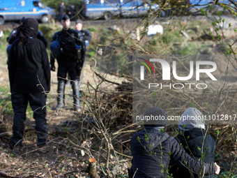 Sympathizers of the 'Ecureuils' are facing the Gendarmerie Mobile near the 'Crem'Arbre' ZAD in the woods in Saix, Tarn Departement, on the p...