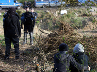 Sympathizers of the 'Ecureuils' are facing the Gendarmerie Mobile near the 'Crem'Arbre' ZAD in the woods in Saix, Tarn Departement, on the p...