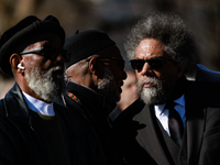 Activist and philosopher Dr. Cornel West, right,  speaks with a religious leader at a rally at Lafayette Square in Washington, D.C. on Febru...