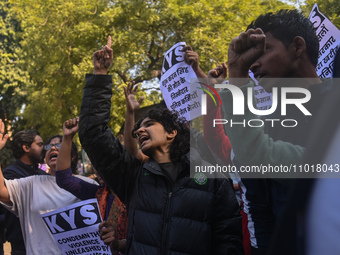 Activists are shouting slogans during a protest against the killings of farmers in the clashes with the police at the borders of the Indian...