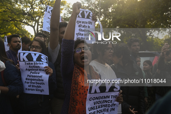 Activists are shouting slogans during a protest against the killings of farmers in the clashes with the police at the borders of the Indian...