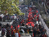 Victims of loan sharks in Nepal are marching towards the Singhadurbar, the administrative capital, in Kathmandu, Nepal, on February 23, 2024...