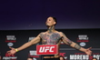 Cristian Quinonez of Mexico is posing on the scale during the UFC Fight Night ceremonial w...