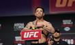 Brandon Moreno of Mexico is posing on the scale during the UFC Fight Night ceremonial weig...