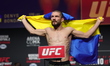 Denys Bondar of Ukraine is posing on the scale during the UFC Fight Night ceremonial weigh...