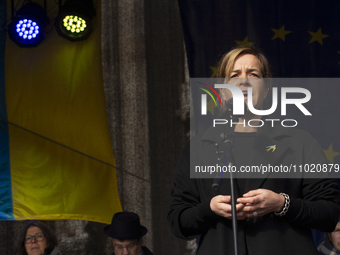 Mona Neubaur, the Minister of the NRW Economy, is speaking on stage as thousands of people participate in a rally in support of Ukraine on t...