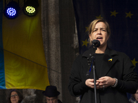 Mona Neubaur, the Minister of the NRW Economy, is speaking on stage as thousands of people participate in a rally in support of Ukraine on t...
