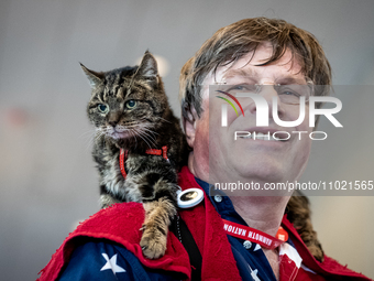 Erik Svane, a resident of France,and his 19-year-old cat, Jixie Juny, attend the annual Conservative Political Action Conference (CPAC) in N... by Allison Bailey/NurPhoto