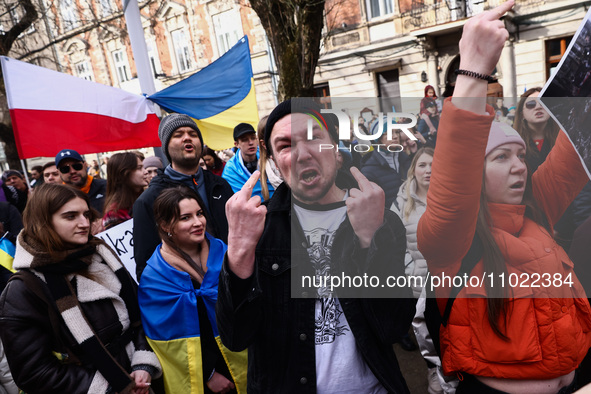 Ukrainian citizens and supporters attend the march ' Together For Victory ' in front of the Russian Consulate General to show solidarity wit...