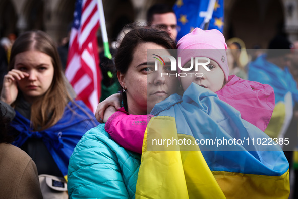 Ukrainian citizens and supporters attend the march ' Together For Victory ' to show solidarity with Ukraine and commemorate two year anniver...