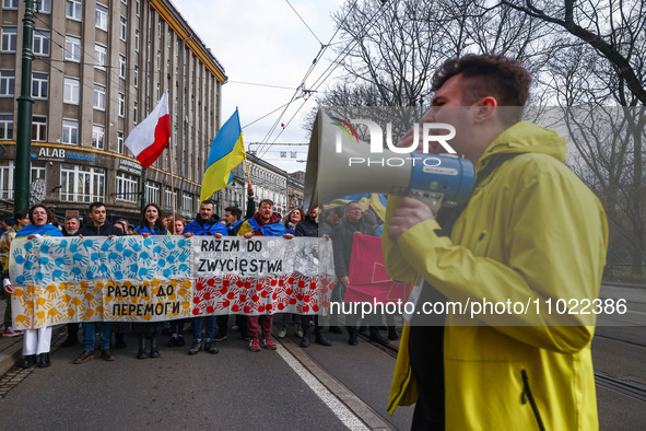 Ukrainian citizens and supporters attend the march ' Together For Victory ' to show solidarity with Ukraine and commemorate two year anniver...
