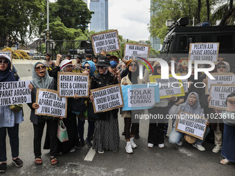 Protesters are shouting slogans during a rally against the preliminary results of the recent general election, which they claim are fraudule...