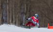 Maciej Mikolajczyk is competing in the FIS Snowboard World Cup parallel giant slalom in Ja...