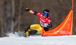 Elias Huber is competing in the men's parallel slalom on the second day of the FIS Snowboa...