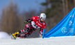 Arvid Auner is competing in the men's parallel slalom on the second day of the FIS Snowboa...