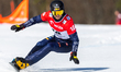 Aaron March is competing in the men's parallel slalom on the second day of the FIS Snowboa...