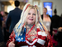 A woman who identified herself by her social media handle, Norse Kitten, attends the annual Conservative Political Action Conference (CPAC)...