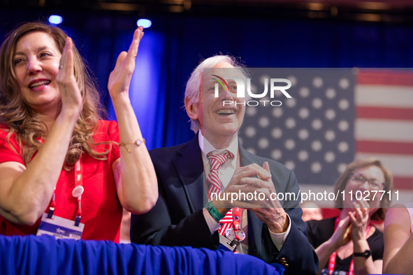 Trump supporters applaud Steve Bannon during the annual Conservative Political Action Conference (CPAC) in National Harbor, MD, February 24,...