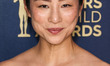 Greta Lee wearing The Row arrives at the 30th Annual Screen Actors Guild Awards held at th...