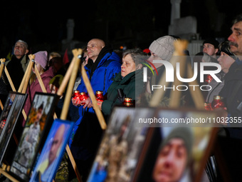 Members of the public are paying tribute to the defenders of Ukraine who perished in combat at the Lychakiv Cemetery ahead of the second ann...
