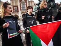 Solidarity with Palestine demonstration against Israeli attacks over Gaza was is held at the Main Square in Krakow, Poland on February 24, 2...