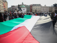 Solidarity with Palestine demonstration against Israeli attacks over Gaza was is held at the Main Square in Krakow, Poland on February 24, 2...