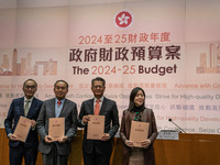 Hong Kong Financial Secretary Paul Chan Mo-po is holding the 2024-25 budget at a government press conference on the 2024-25 government budge...