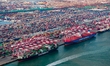 Containers are being loaded and unloaded at the Qianwan Container Terminal of Qingdao Port...