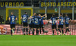 The FC Inter team is celebrating after scoring a goal during the Italian Serie A football...