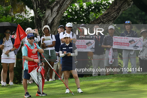 Ayaka Furue of Japan is in action during round three of the HSBC Women's World Championship at Sentosa Golf Club in Singapore, on March 2, 2...