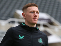 Elliot Anderson of Newcastle United is playing in the Premier League match against Wolverhampton Wanderers at St. James's Park in Newcastle,...