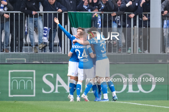 Brescia Calcio FC is celebrating after scoring their fourth goal during the Italian Serie B soccer championship match against Palermo FC at...