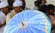 Hindu devotees are praying during the Melasti ritual ceremony at Parangkusumo Beach, Bantu...