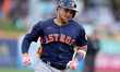 Yainer Diaz #21 of the Houston Astros is batting during the second inning of a baseball ga...