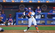 Rylan Bannon, #58 of the New York Mets, is hitting a double during the fifth inning of a b...