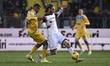 Walid Cheddira of Frosinone Calcio and Antonino Gallo of U.S. Lecce are competing during t...