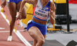 Na'Asha Robinson of the USA is competing in the 4x400 meters relay at the 2024 World Athle...