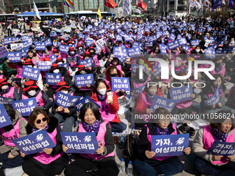 Hundreds of female workers are attending the rally for the International Women's Day strike, chanting slogans at the 2024 Women's Strike Org...