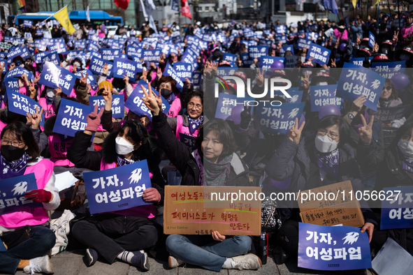 Hundreds of female workers are attending the rally for the International Women's Day strike, chanting slogans at the 2024 Women's Strike Org...