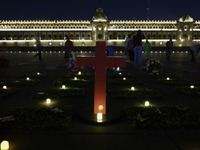A pink cross is standing in the Zocalo of Mexico City, on the evening before protests on the occasion of International Women's Day in Mexico...