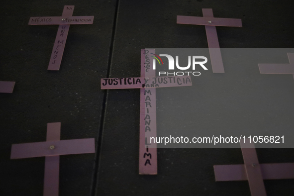 Pink crosses are being viewed in the Zocalo of Mexico City, during an evening before protests on the occasion of International Women's Day i...