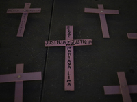 Pink crosses are being viewed in the Zocalo of Mexico City, during an evening before protests on the occasion of International Women's Day i...