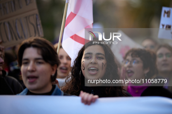 A woman is shouting slogans during the International Women's Day demonstration in Granada, Spain, on March 8, 2024. International Women's Da...