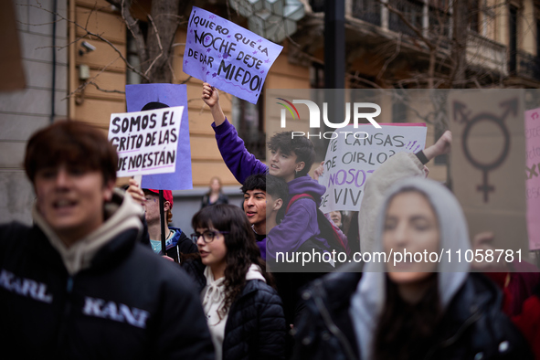 Protesters are holding banners and shouting slogans during the International Women's Day demonstration in Granada, Spain, on March 8, 2024....
