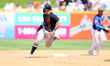 Detroit Tigers' Jace Jung #84 is running for third base during the eighth inning of a spri...