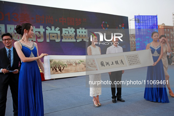 Actress Zhang Ziyi is attending a celebration event at a property in Zhengzhou, China, on August 17, 2013. 