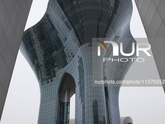 A photo taken on March 3, 2024, shows the Urumqi Cultural Center, which is a complex that includes a grand theater, concert hall, book mall,...